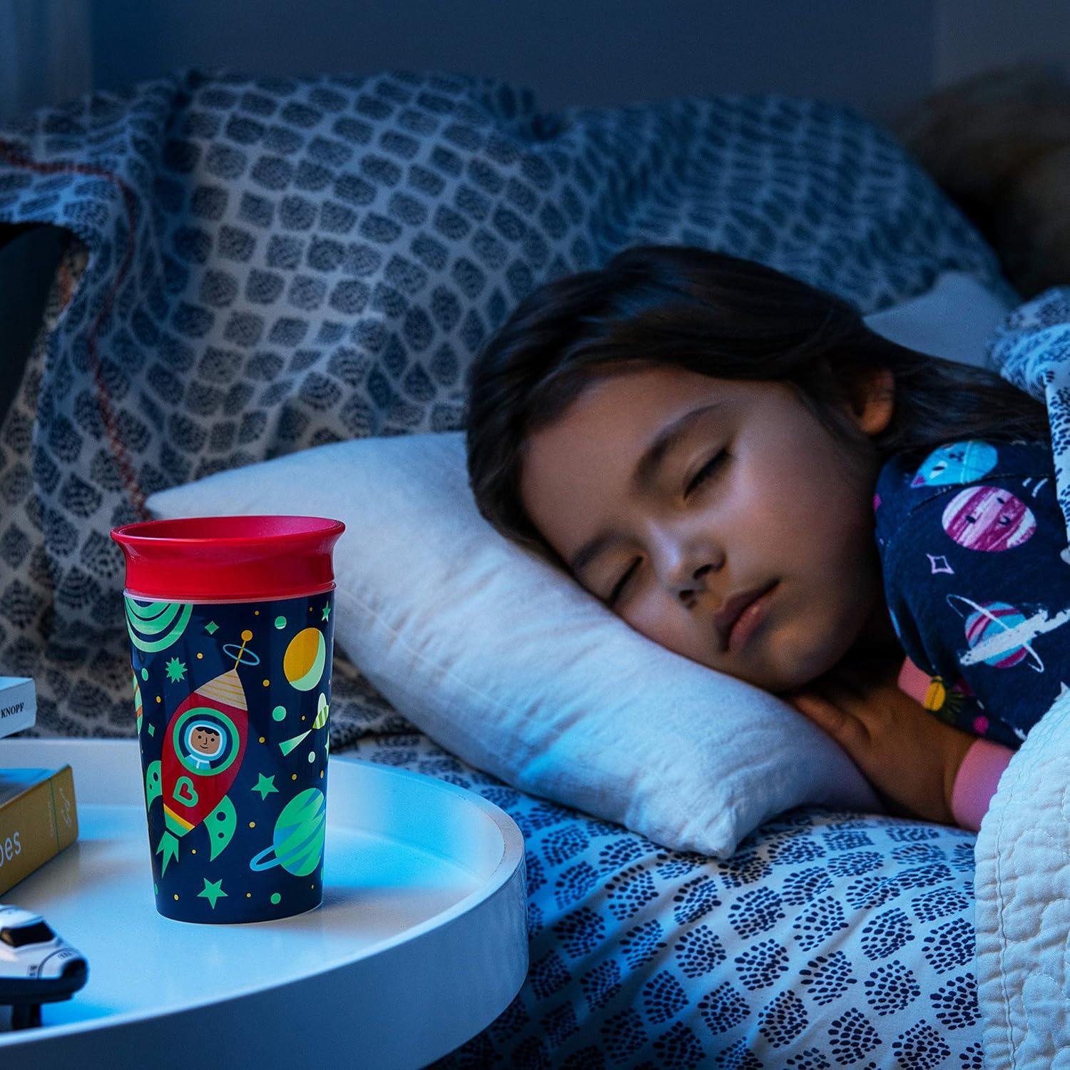 imageMunchkin Glow in The Dark Toddler Sippy Cup with Miracle 360 Spoutless Spill Proof Drinking Edge 9 Ounce Camping YellowAstronaut