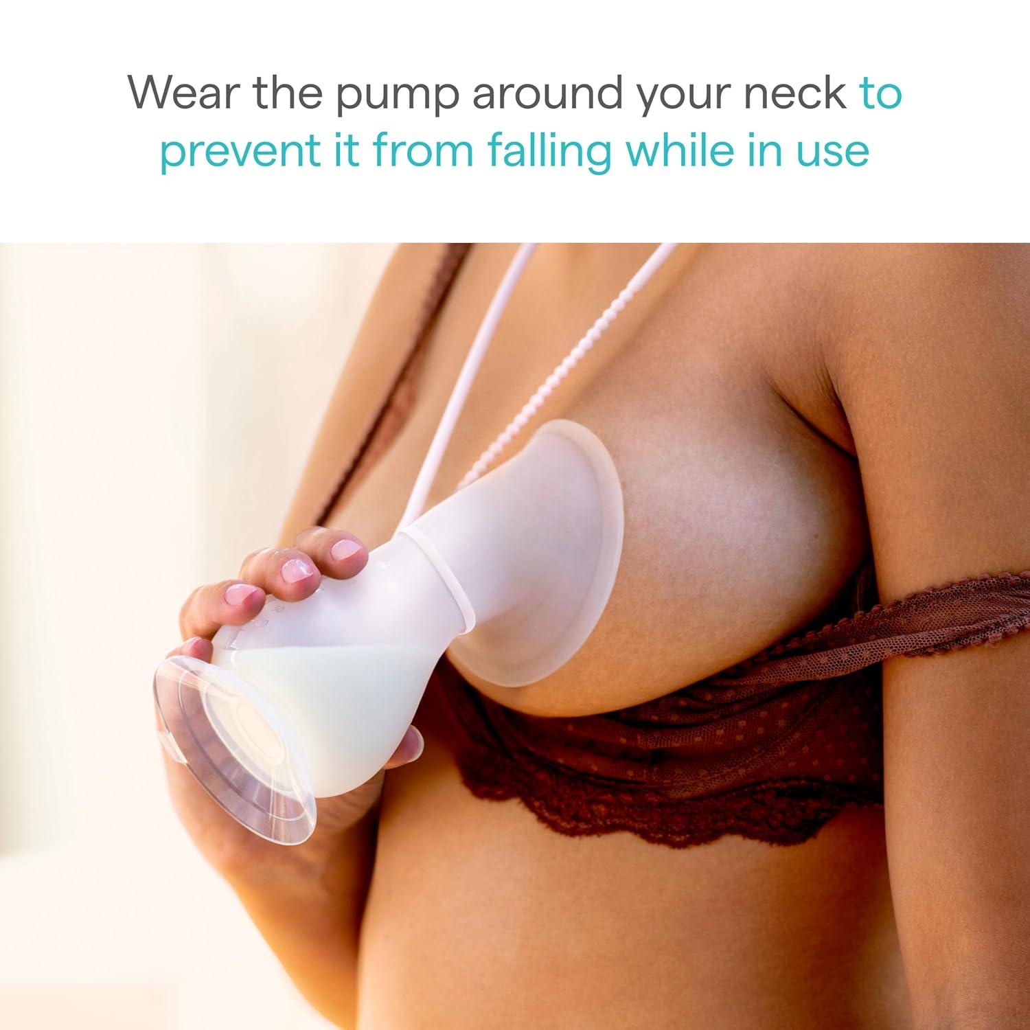 imageMunchkin Manual Breast Pump for Breastmilk Food Grade Silicone BPA Free 4 Ounce  Portable Breastfeeding Essential for Expressing Milk at Home Work and On The Go ClearPinkBreast Pump