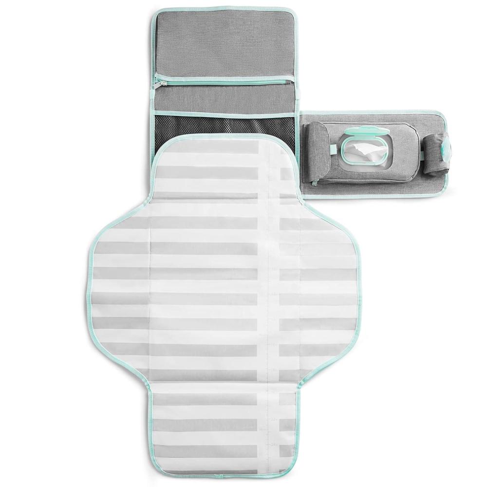 imageMunchkin Portable Changing Pad  Lightweight and Compact Baby Diaper Changing Mat with SilverIon Technology Includes 12 Diaper Disposal Bags Grey